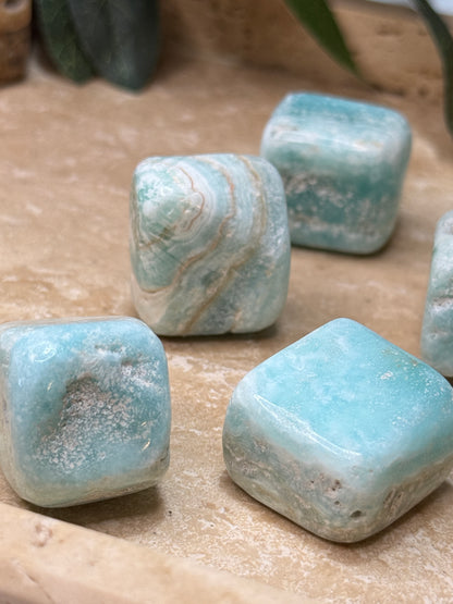 Caribbean Calcite tumble with ocean blue and sandy brown coloring