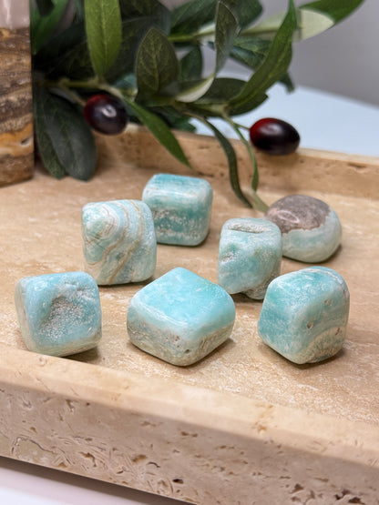 Caribbean Calcite tumble with ocean blue and sandy brown coloring