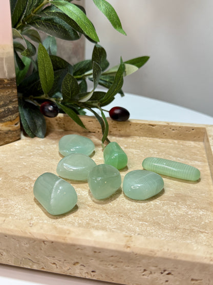 Pistachio Calcite tumble with fresh green color and beautiful high polish