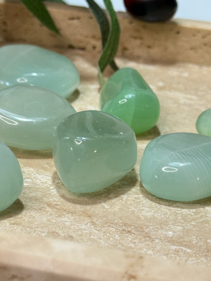 Pistachio Calcite tumble with fresh green color and beautiful high polish